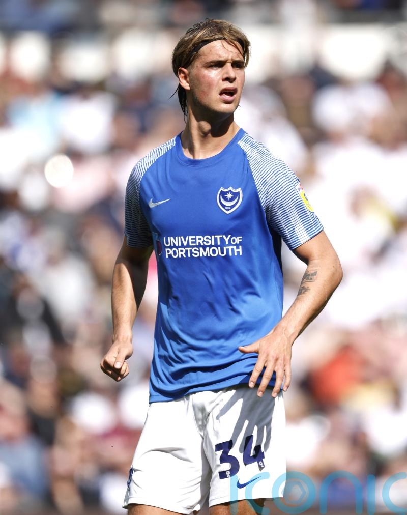 Ryley Towler snatches leaders Lincoln a point at Huddersfield