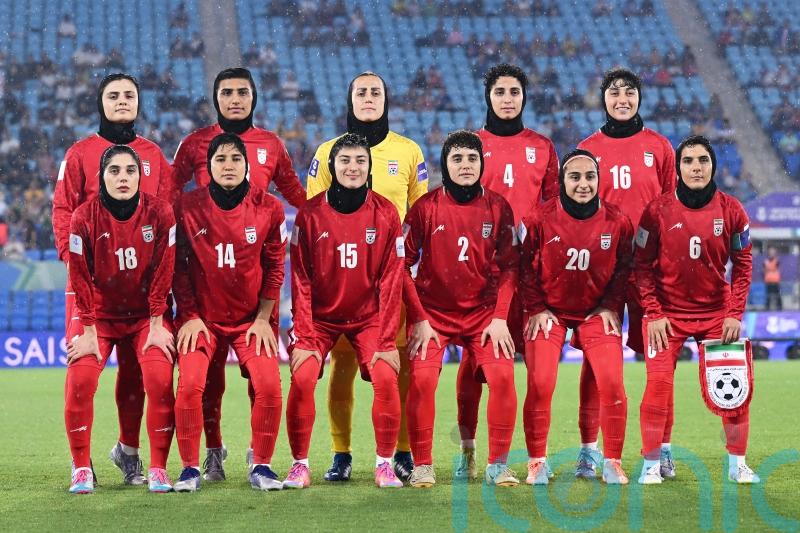 Iran women&rsquo;s football team returns home after some players sought asylum