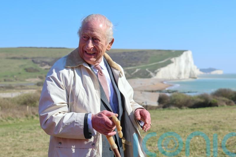 King opens longest managed coastal walking route in the world