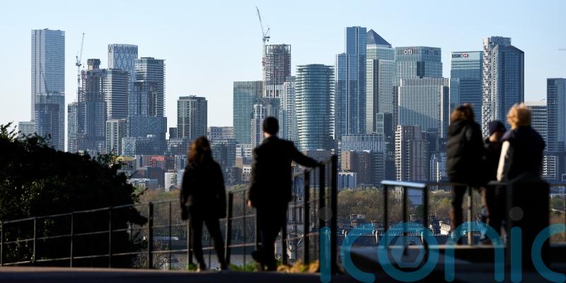 Stocks swing wildly as Trump cools Iran rhetoric