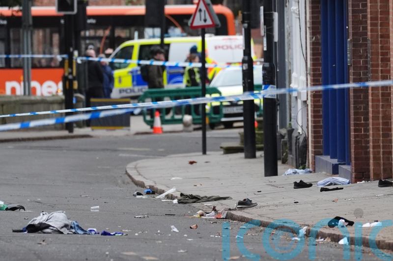 Seven people seriously injured and man arrested as pedestrians hit by car