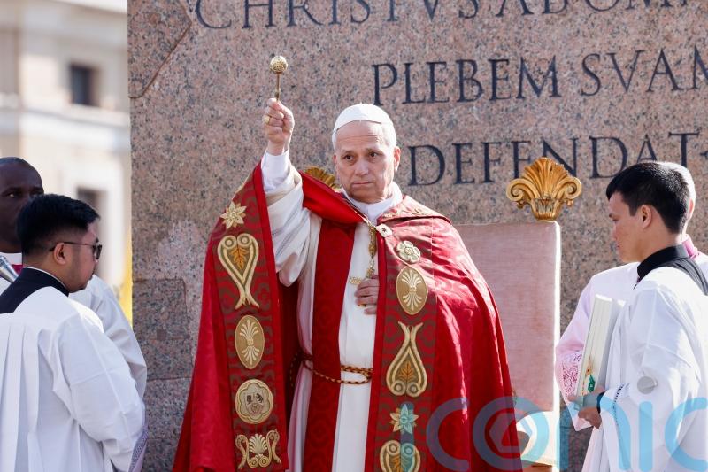 Pope uses Palm Sunday Mass to reject claims God justifies war