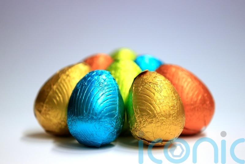 Shelling out: Shoppers &lsquo;buying chocolate Easter eggs for four people on average&rsquo;