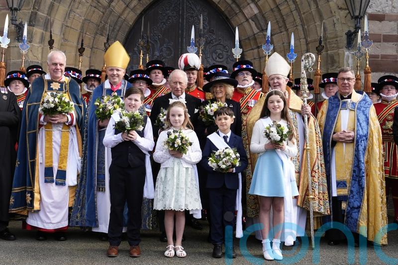 King presents Maundy gifts as service is held in Wales for only the second time