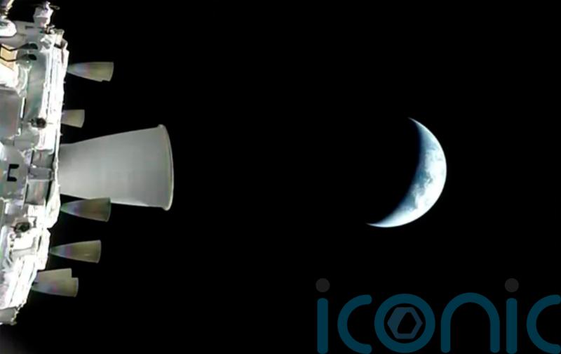 Manned mission to Moon fires engines to leave Earth&rsquo;s orbit