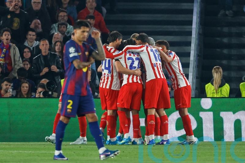 Atletico Madrid stun 10-man Barcelona to take control of Champions League tie