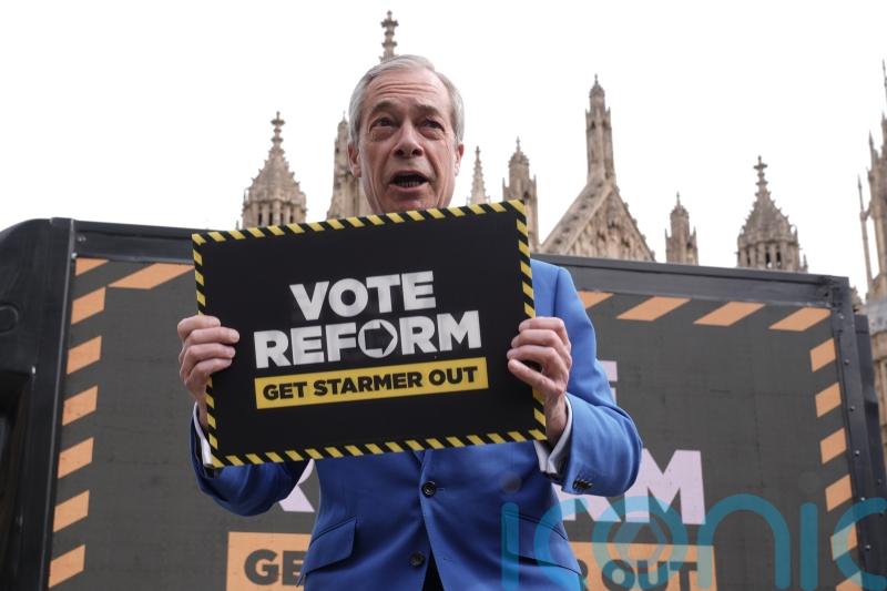 Nigel Farage unveils &lsquo;Vote Reform. Get Starmer out&rsquo; slogan
