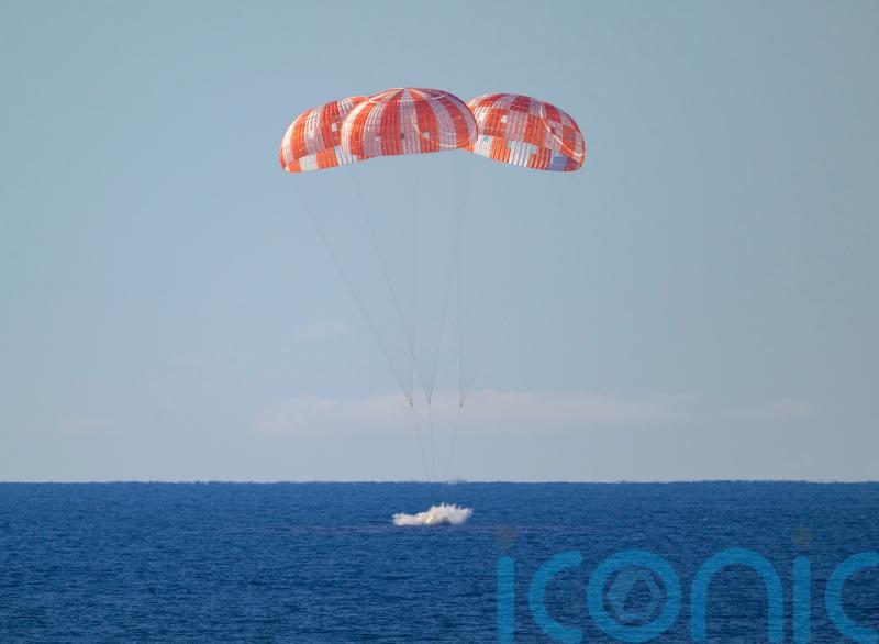 First manned Moon mission in more than 50 years splashes down after epic voyage