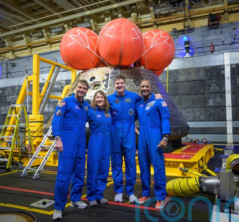 Artemis astronauts receive thunderous welcome home at Mission Control