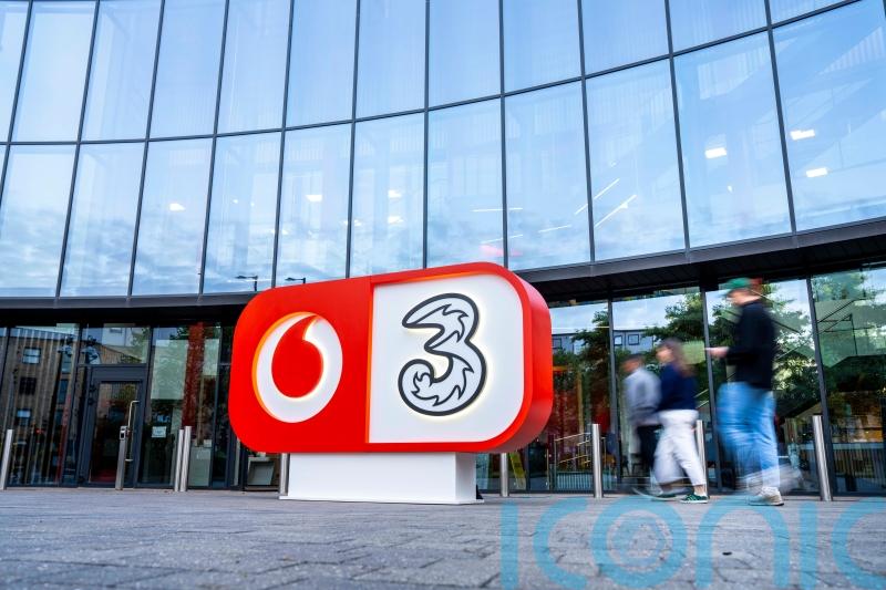 Vodafone and Three to combine brands on high street after &pound;15bn merger