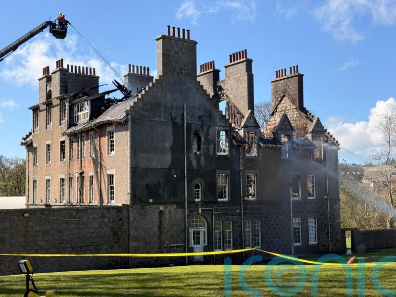 Listed building near hospital wrecked by fire as crews remain at scene