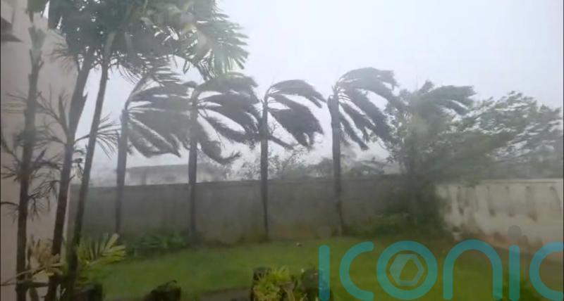 Residents take shelter as major typhoon in Pacific batters remote US islands