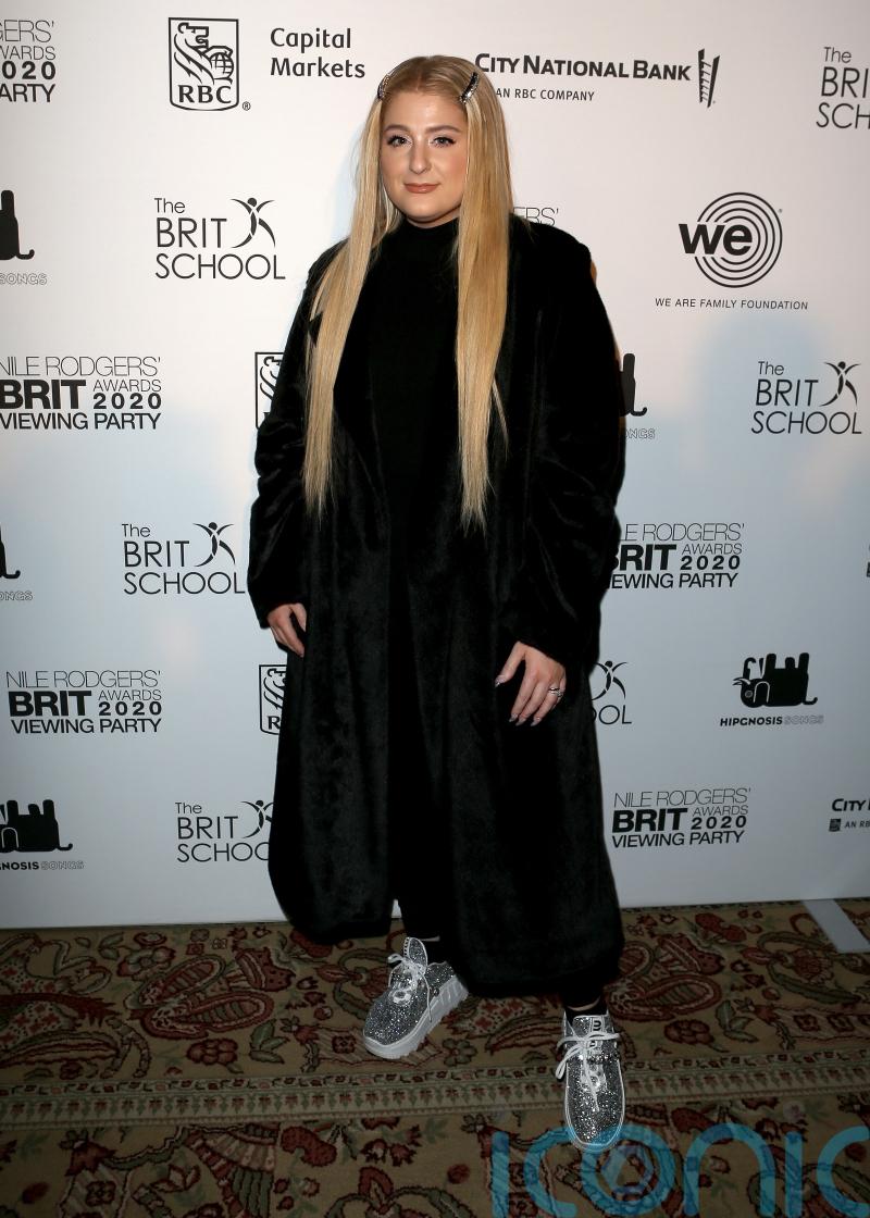 Meghan Trainor apologises to fans as she cancels tour