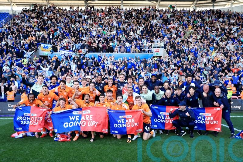 Cardiff promoted after win at Reading and dramatic help from elsewhere