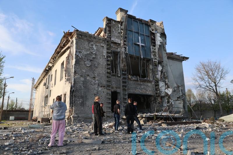 Russian attacks kill at least two as Ukraine strikes drone factory