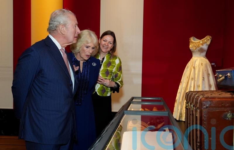 Charles sees late Queen&rsquo;s quirky outfits at Buckingham Palace exhibition