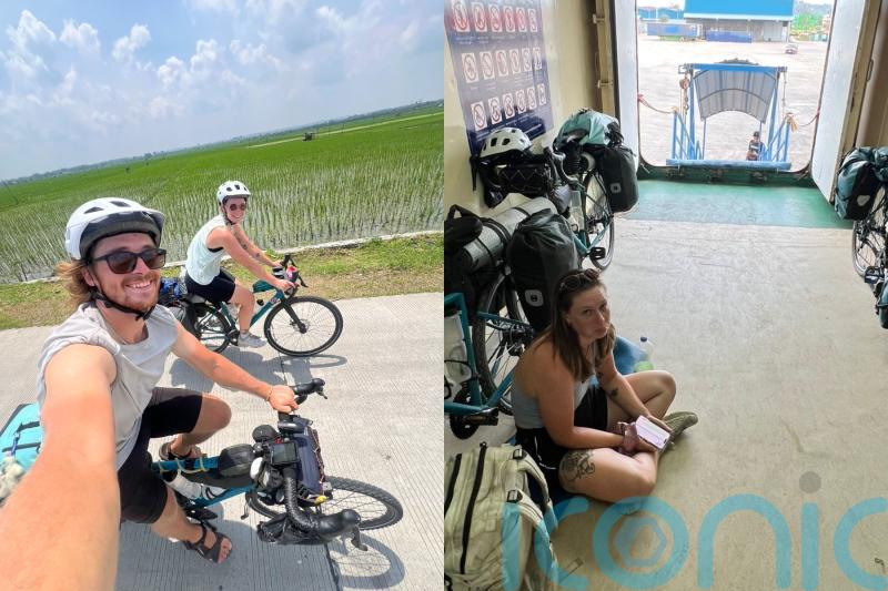 Couple biking 100km a day from Thailand to Australia, inspired by dad&rsquo;s 1980s trip, say &lsquo;we&rsquo;ll do it no matter the cost&rsquo;