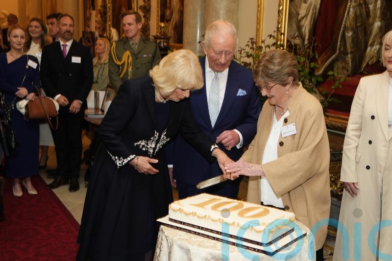 King joins centenarians for special celebration to mark life of his mother