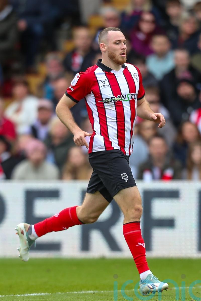 Lincoln seal title as Ben House double downs Doncaster