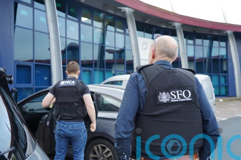 Four arrested in fraud probe into firms delivering home insulation contracts