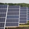 File photo of solar panels on a solar farm.