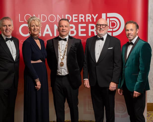 David Sterling, Chair at NIE Networks; Anna Doherty, Derry Chamber Chief Executive; Steven Lindsay, Derry Chamber President; John Harkin, Founder of Alchemy Technology Services; and Alistair Hay, Founder of Emerald Guitars.